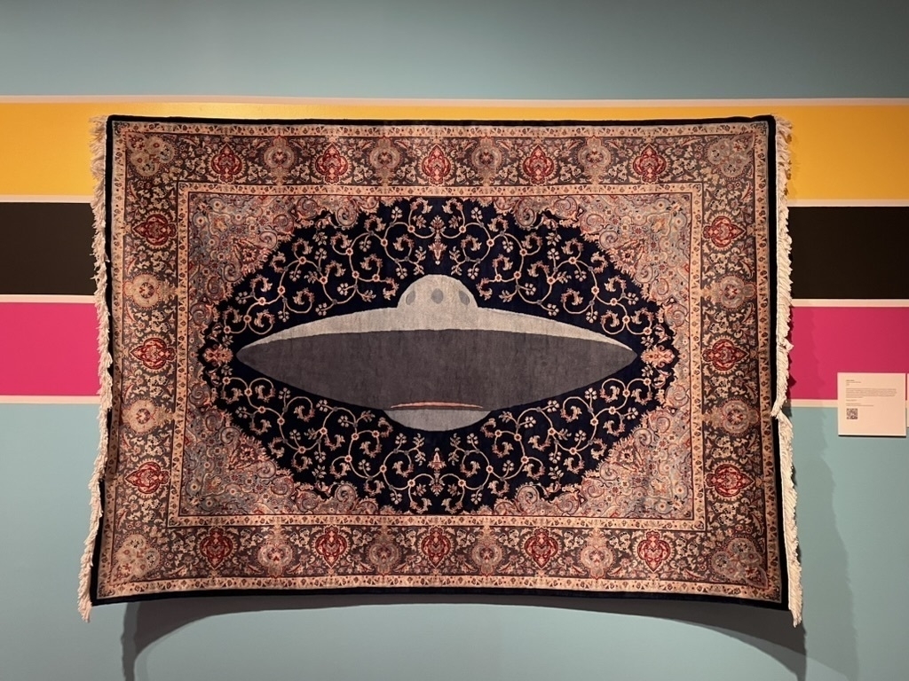 Oriental-style rug with a UFO in the center